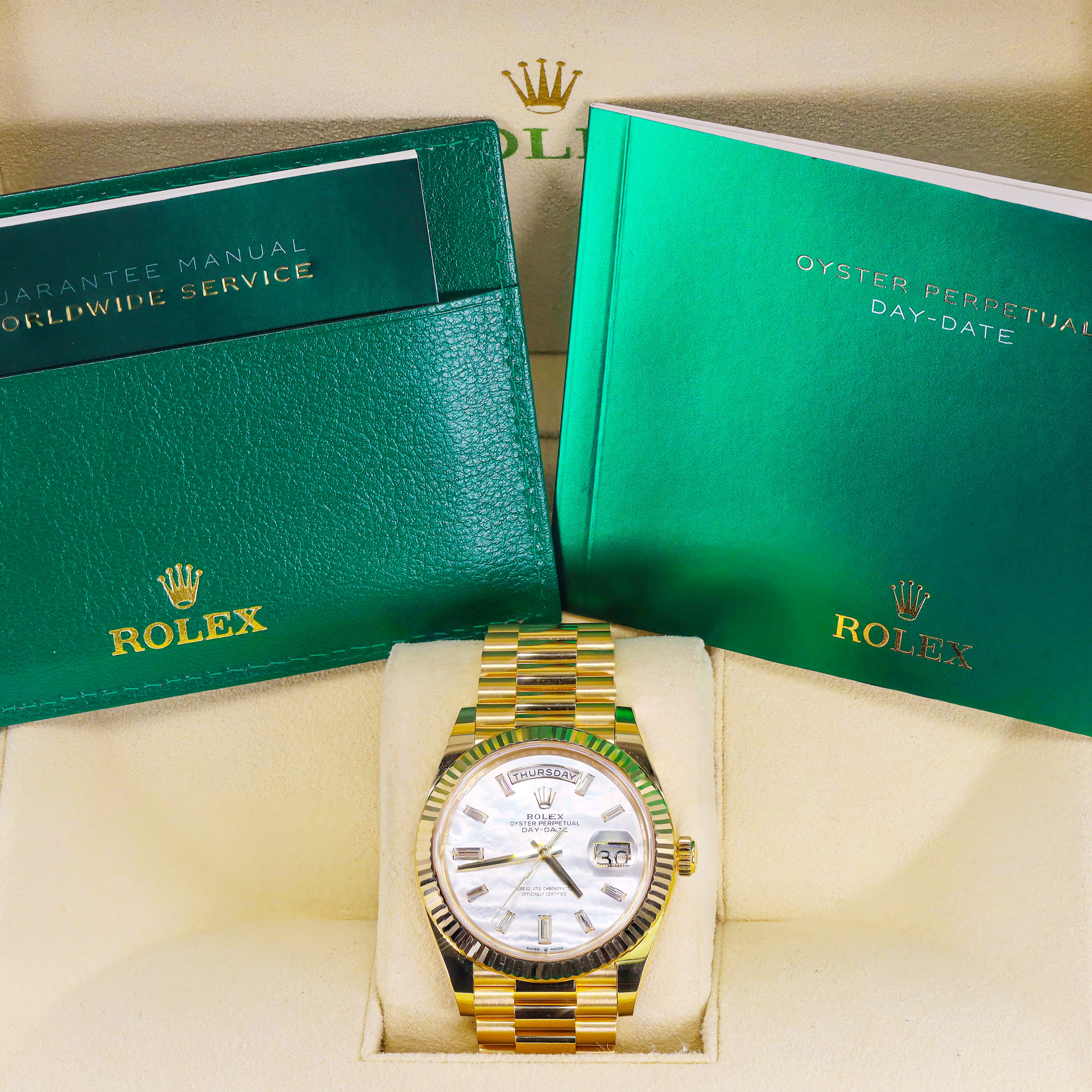 Rolex 228238 Day-Date 40mm Yellow Gold Mother of Pearl Baguette Diamond Dial